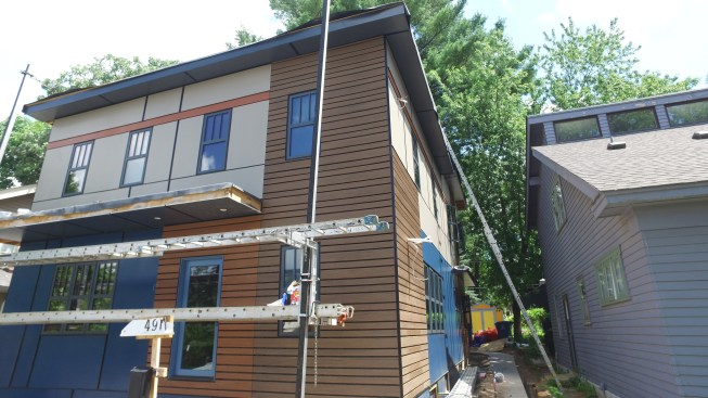 Mixing the open-joint system with a panel system, the author created an "almost-Mondrian" aesthetic. In this composition, the open-joint areas offered a distinct warm and patterned texture.