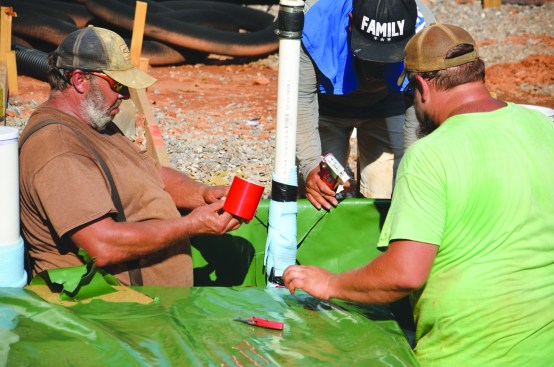 They wrapped the conduit and pipe that penetrated the poly with more poly, tape, and sill sealer.