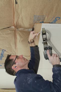 As you screw the panel’s butt end to the backing, it draws the edge in slightly, creating a recessed joint.