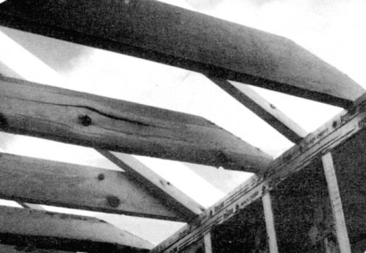 Overtapering  joists to fit beneath roofs creates  inadequate joist depth at  the plate.