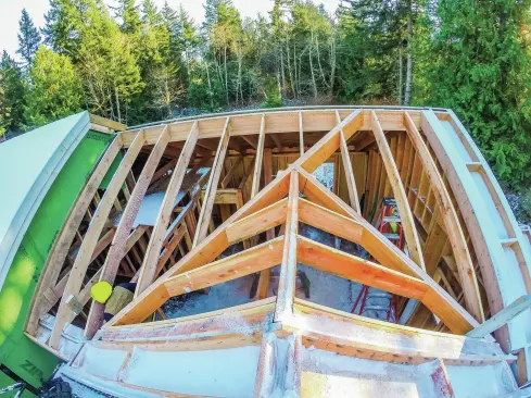 On this roof, the main structural valley rafter intersects and is supported by the main ridge beam. This longer, supporting valley rafter carries the lower (minor) ridge and the intersecting (supported) valley.
