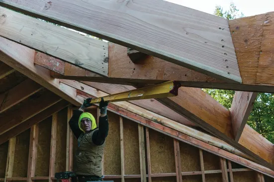 We beveled the bottom edge of the intersecting ridge to allow for a nice, clean drywall line.