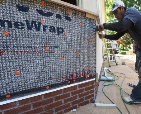 Moisture protection for Wall lead photo: Cedar Breather drainage matrix over Tyvek  Home Wrap provides drainage and drying for a PVC panel-type impermeable siding.