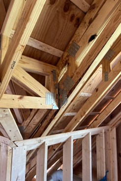 To facilitate the natural roof ventilation required for Tesla solar shingles, the crew installed 3/4-inch battens on top of the roof trusses.