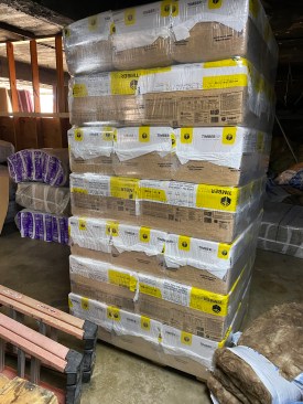 The tightly packed bags need to be broken apart when putting them into an insulation blower.