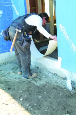 After flashing the sill with flashing tape ...
