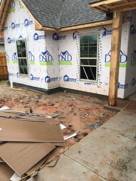 Wet, rainy conditions can lead to damp interiors. If the interior is not conditioned before installing the drywall, the chances for a lot of fastener pops and seam cracks are high.