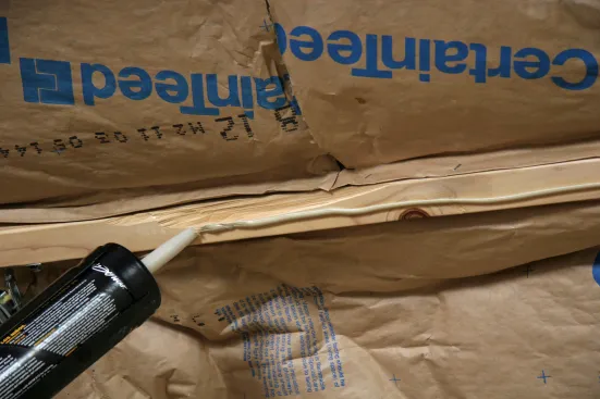 One way to cut down on the number of fasteners is to secure the drywall with an approved ASTM C557 standard drywall adhesive.