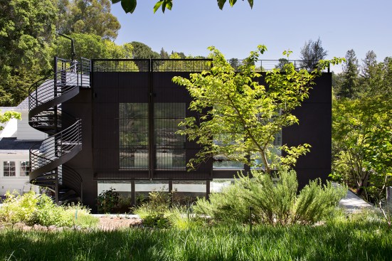 San Francisco-based Klopf Architecture worked with the owners of this home in Orinda, Calif. to create a clean, modern addition to the traditional home. A metal spiral staircase leads to a new rooftop patio that offers views of the surrounding landscape.
