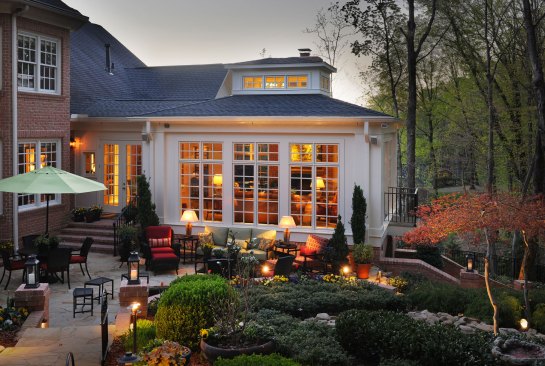For this traditional Nashville home, Scott Wilson designed a sunroom that extends into the owners' beloved, carefully landscaped backyard.See the full article about this award-winning project.