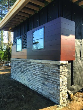 A full-scale mockup allows clients to visualize the difference between raked and full mortar joints in the stone cladding and the mitered Parklex cladding corner detail.