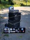 With the road closed to all access except foot traffic, the author was forced to lash his musical equipment to a hand truck in order to make a gig on the day after the storm. He wore the hard hat seen on top to get through the safety zone.