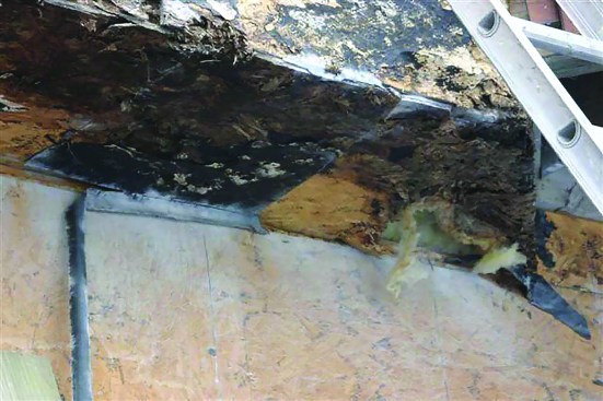 A “stucco bucket” on this stuccoed cantilever resulted in the wall kicking the bucket, so to speak. Water had nowhere to drain and eventually overwhelmed the WRB, rotting the framing beneath.