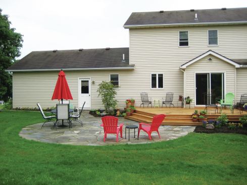 The upper deck offers a private space for sitting and reading the newspaper or for bad-weather grilling. On the lower patio, larger groups can gather, socialize, eat a meal, or just hang out.