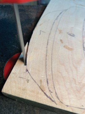 Here is an example of a through-cut in a section of maple. A slight back bevel allows for easier fine-tuning later.