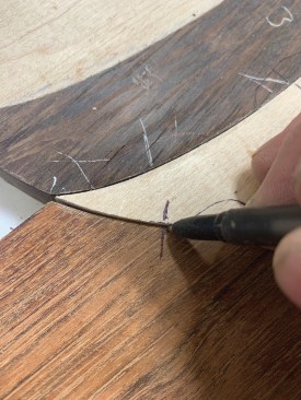 Anchor marks help the author keep the pieces in alignment as he refines the fit.