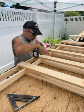 Next, he screwed the frame to the new jamb.