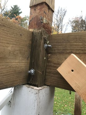 Shallow notches had been cut into this 4x4 post to allow room for the roof deck flashing membrane, while deeper notches were cut for the 2-by framing, critically weakening the post.