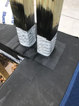 The author sealed the roof flashing boots to the posts with Siga Wigluv, a high-performance, water-resistant tape.