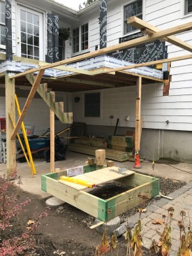 An overhead frame that defines the stair layout was used to ensure that the new support posts and landing were accurately located on top of the piers.