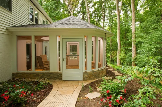 Another benefit of the conical roof design is that it doesn't obstruct views of the nearby woods from the home's second-floor windows.