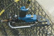 Figure 4. A special tool rented from Galvacore joins together panels with wire rings.