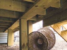 Figure 1. Even with concrete footings below, a 2x8 on the flat does not qualify as a beam.