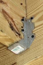 Figure 4. Every hole of a piece of framing hardware must be filled with the proper nail or structural screw.