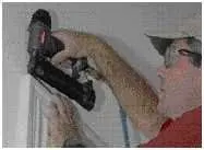 He joins the miter together with glue, and cross-pins the joints.