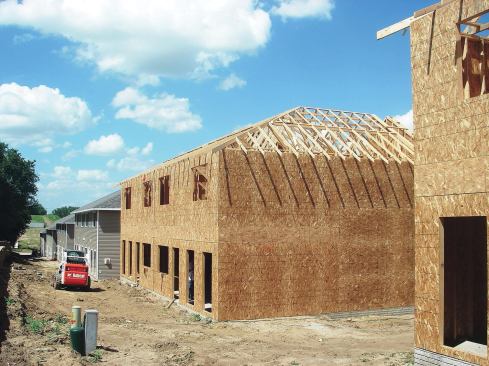 One- to four-unit apartment buildings like these may be a smart option for single-family home builders who are thinking about making real estate investments. 