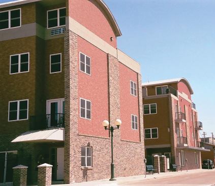 Multifamily buildings with more than five units — such as this 12-plex, which 

the author built in a desirable downtown neighborhood — have many more requirements and exponentially higher construction costs per square foot than buildings with fewer units.