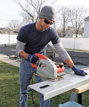 A specialized steel-cutting saw makes quicker work of cuts and does a better job containing the hot chips of steel from the cuts.