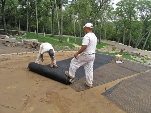 Synthetic geogrid is used when retaining walls are built on soils containing a lot of silt or clay, or when wall heights exceed 4 feet.