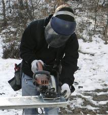 Figure 4. Full face and hearing protection and a special blade for ferrous metals are needed to cut steel joists.