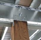 Figure 11. Wood posts can be joined to steel beams with regular hardware.