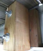Figure 13. Attach newel posts to steel framing with two 1/2-inch bolts. If the posts are pressure treated, separate them from the steel with flashing membrane.