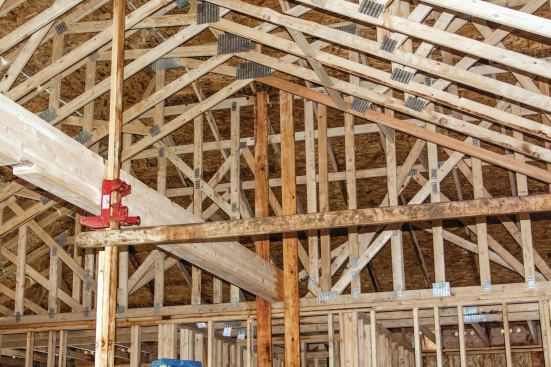 When lifting with pumpjacks, be sure to brace the legs back to the framing to keep the jack poles straight.
