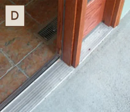 Figure 2-D. An ADA-compliant barrier-free threshold with a low curb completes the zerostep entry.