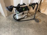 The CT36 dust extractor comes with a removable cradle for holding the sander when not in use. The top of the extractor will also fit the Festool Sustainer boxes