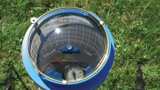The Solar Pathfinder houses a sun-path diagram within a plastic dome. For a detailed description of its use, go to @EnergyUME on YouTube.