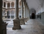 Columns on pedestals in the cloister of the Royal Seminary College of Corpus Christi in Valencia, Spain. What does wainscoting and column pedestals really have in common?  (photo by Joanbanjo)